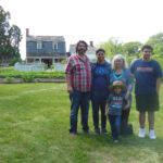 Visitors in front of the house
